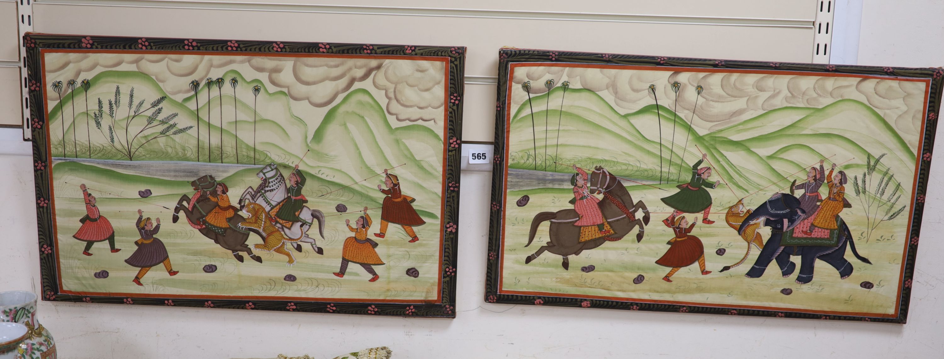 Indian School, pair of gouache on fabric, Tiger hunting scenes, 40 x 66cm, unframed, but wrapped around the stretcher